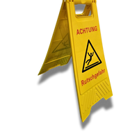 Warnschild VORSICHT RUTSCHGEFAHR